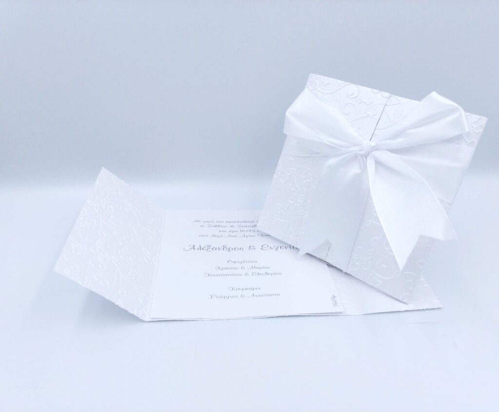 Προσκλητήρια γάμου πολυτελείας U024 relief ανάγλυφο με κορδέλα, της εταιρίας NewAge invitations