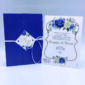 Προσκλητήρια γάμου με τριαντάφυλλα | 22g001 porr roses Προσκλητήρια γάμου με λουλούδια τριαντάφυλλα μπλε και λευκά | 22g001 porr roses NewAge invitations Προσκλητήριο για γάμο, έγχρωμης εκτύπωσης. Περιτύλιγμα χαρτί, κορδέλα και καρτάκι για το κλείσιμο.